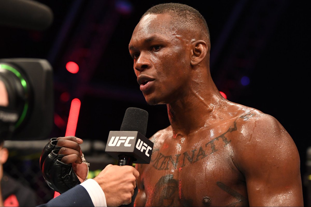 Dooplaaa's tweet photo. Africa now has 3 UFC Champions, you love to see it #UFC260 https://t.co/jOn5dEmLcU