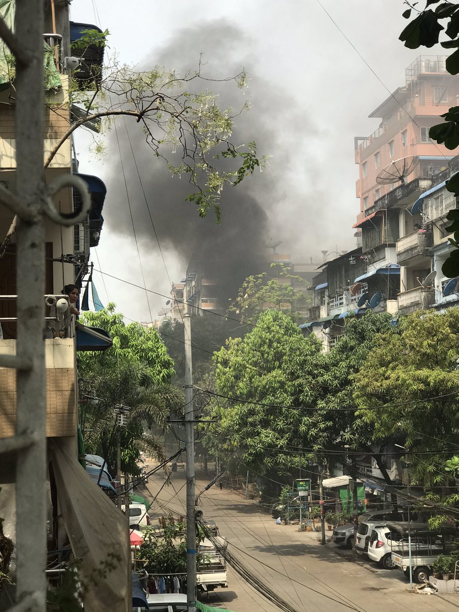 YanonePhue's tweet photo. Happening in KyarKwatThit st , Kyauk Myaung now. Terrorists set fire to burn down the barricades.                       JUNTA MASSACRE 
#Mar28Coup
#WhatsHappeningInMyanmar https://t.co/2khYfvWIJi