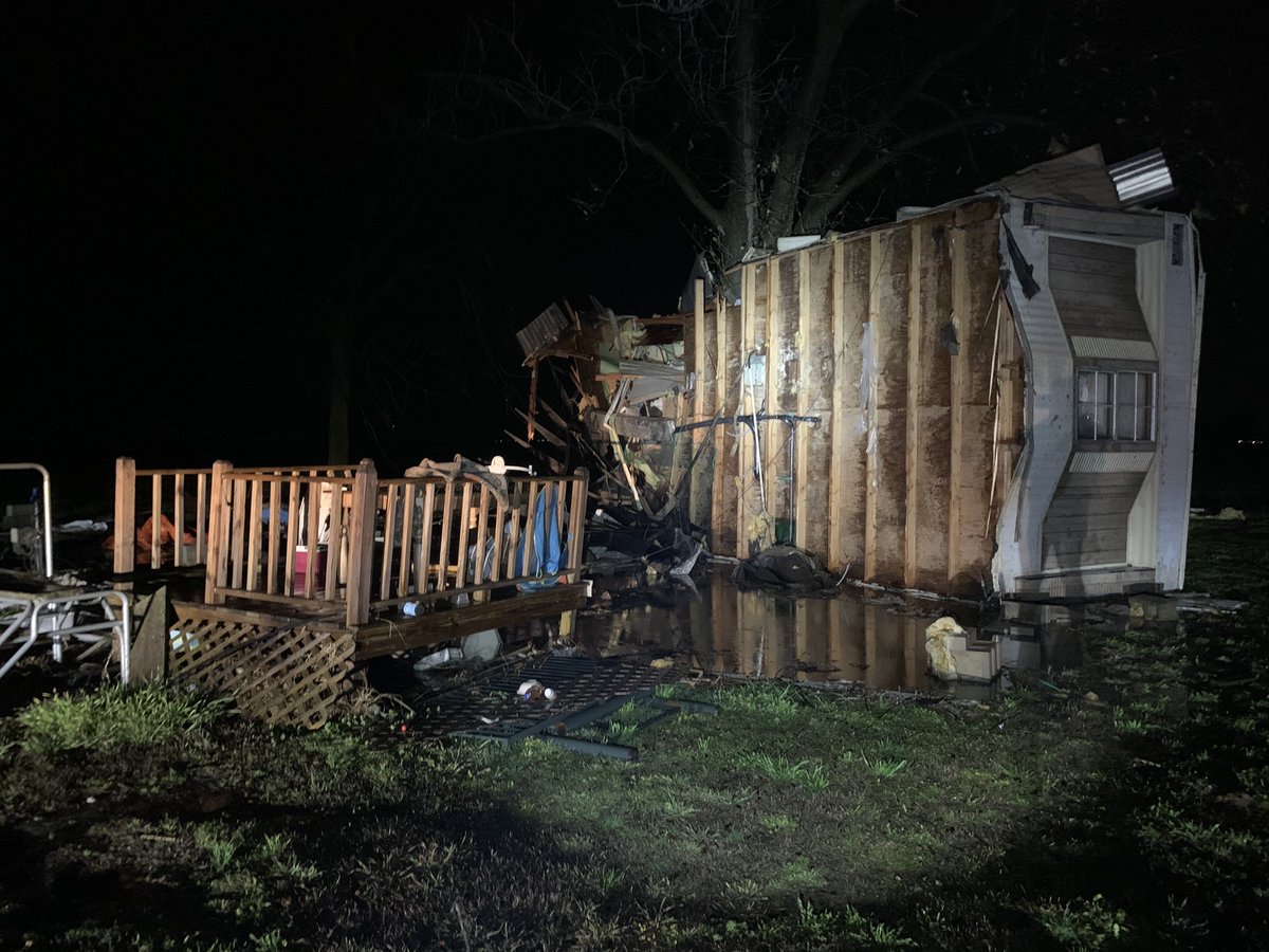 mandyhrachnews's tweet photo. Wow. Devastating damage in Mississippi County, Arkansas. This mobile home is wrapped around a tree  in Carson Lake. https://t.co/J0PDbw2t4U