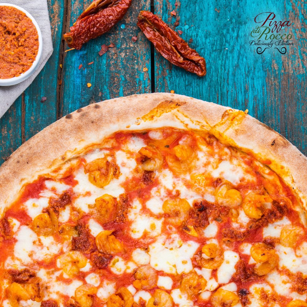 PizzaDiRocco's tweet photo. There’s regular pizza…...then there’s the Gamberi Pizza! 🍤 
Made with a tantalising blend of tomato sauce, fior di latte mozzarella, roast garlic oil, homemade sundried tomato pesto, and marinated shrimp, it’s a unique kind of pizza that’s shrimply delightful! ❤️

#pizzadirocco https://t.co/fKpOH521fG