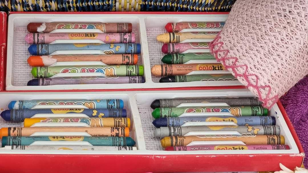 YungVictor7's tweet photo. Funeral of a 11 years old girl who was killed yesterday by military terrorists was held today. Colour pencils and drawing books are seen in the coffin of a drawing loving child.
JUNTA MASSACRE 
#WhatsHappeningInMyanmar  
#Mar28Coup https://t.co/kSfUhJprFr