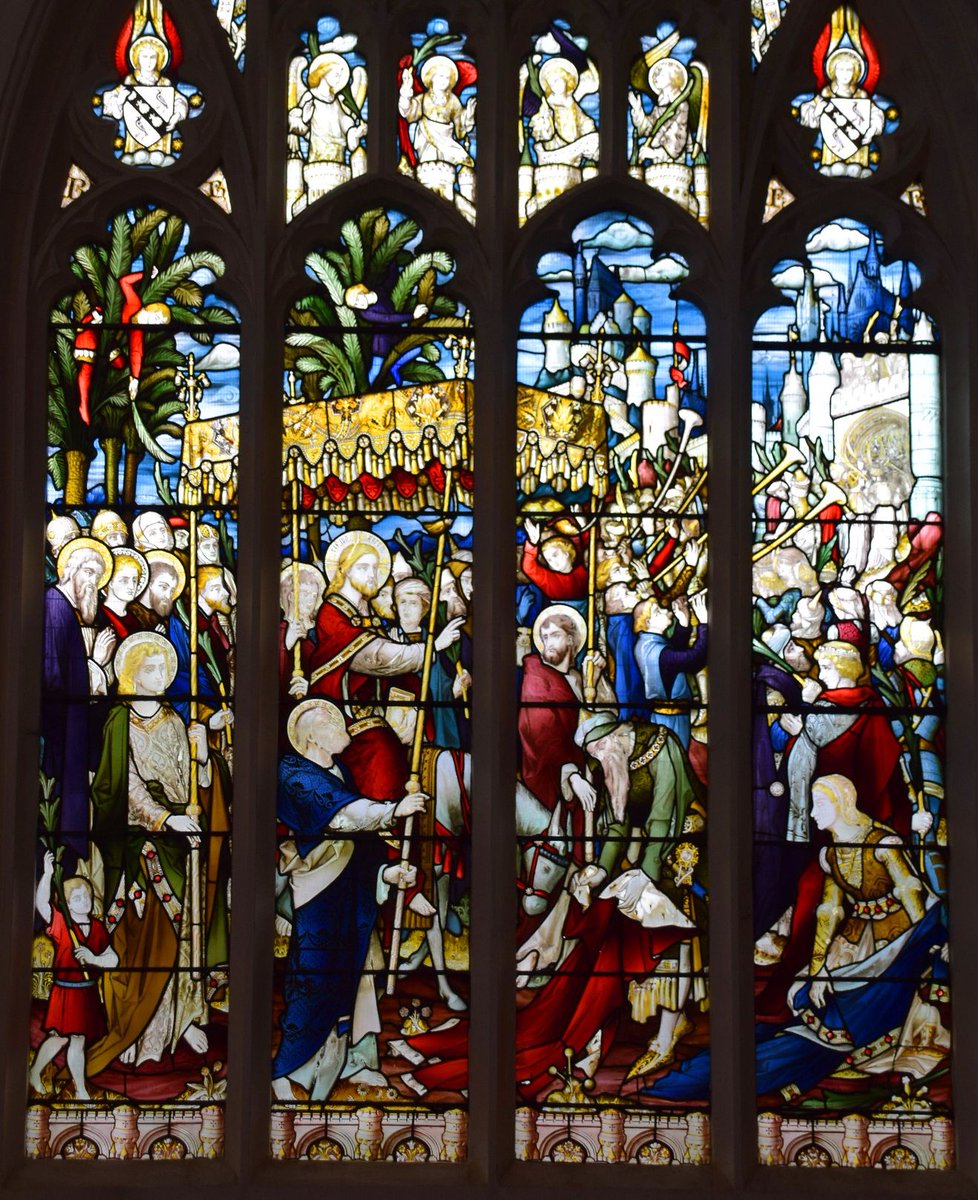Today is Palm Sunday, when the Church remembers Christ's final entry into Jerusalem. A detail of the 1920s west window at Stalham, Norfolk, perhaps by Hardman &amp; Co? Half a century earlier, John Powell's glass for Hardman &amp; Co at St Neots, Cambridgeshire is a much busier scene!