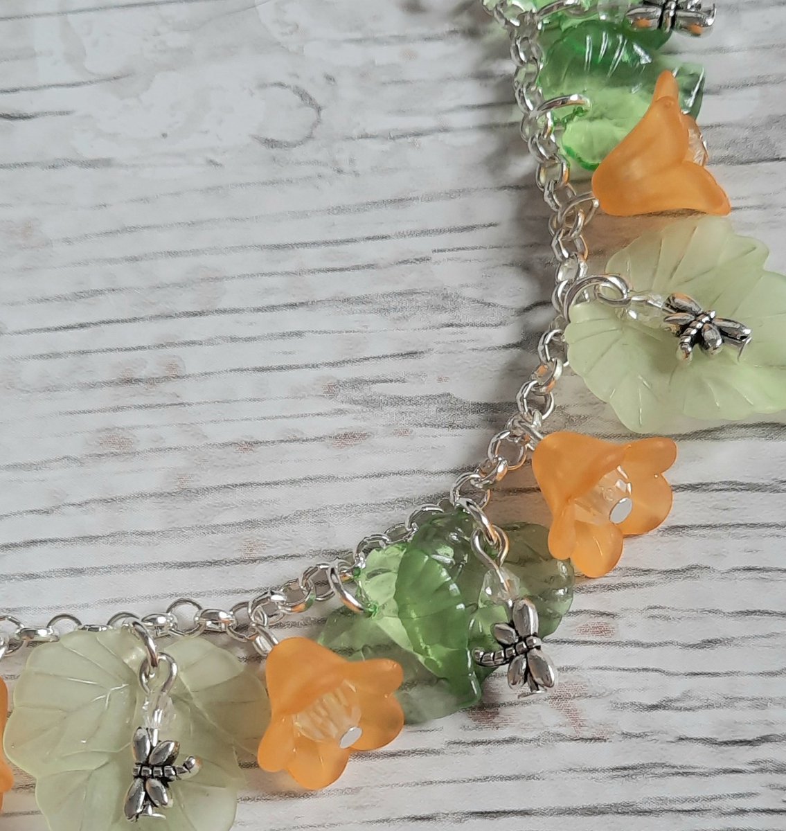 I absolutely love giving my charm bracelets their own identity. Each of these bracelets are one of a kind pieces. This one is Dragonfly Lake
Soft coloured leaves and flowers with tiny dragonflies throughout.
#UKGiftAM #ooak #ooakjewellery #handcrafted #shopsmall