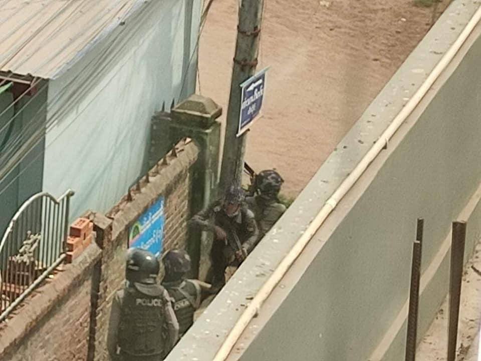 DimpleMariah's tweet photo. Photo evidences of bloodthirsty military thugs pointing guns into a civilian’s house, chasing people for no reasons at all. Even staying inside our own home is not safe anymore in Myanmar. 
JUNTA MASSACRE 
#WhatsHappeningInMyanmar  
#Mar28Coup https://t.co/zBEJCqMoBC