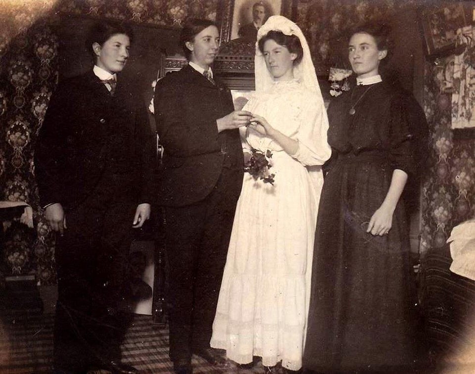 'Wedding between female lovers'. Photographed in the 1900s.