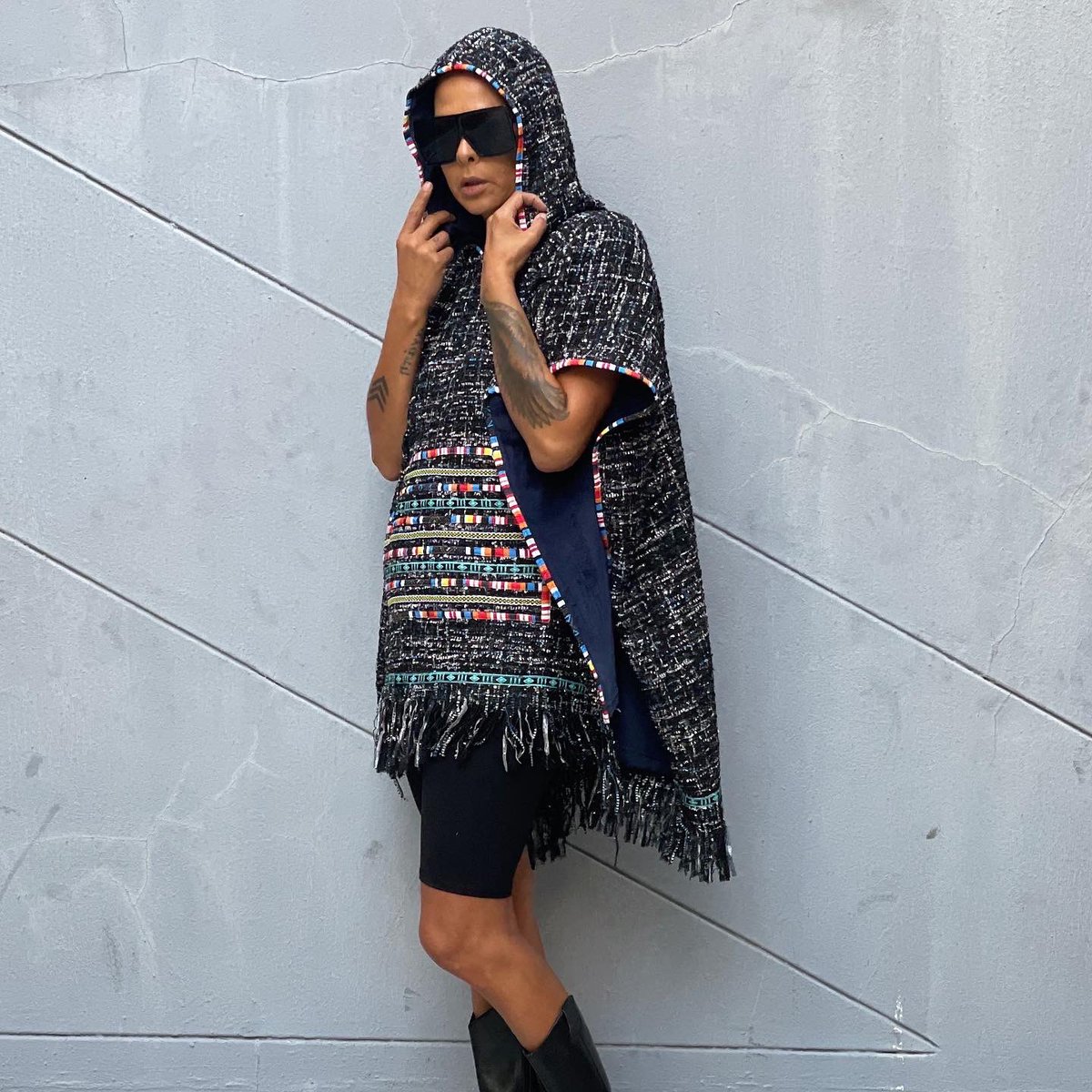 The axe forgets, the tree remembers....
<a href="/nicoleah77/">Nicoleah Ogle/ NiX</a> in our Mbidzo metallic tweed poncho with Venda stripe detail - available at <a href="/AfricaRiseStore/">AfricaRise</a> Sandton City #FundudziWarrior