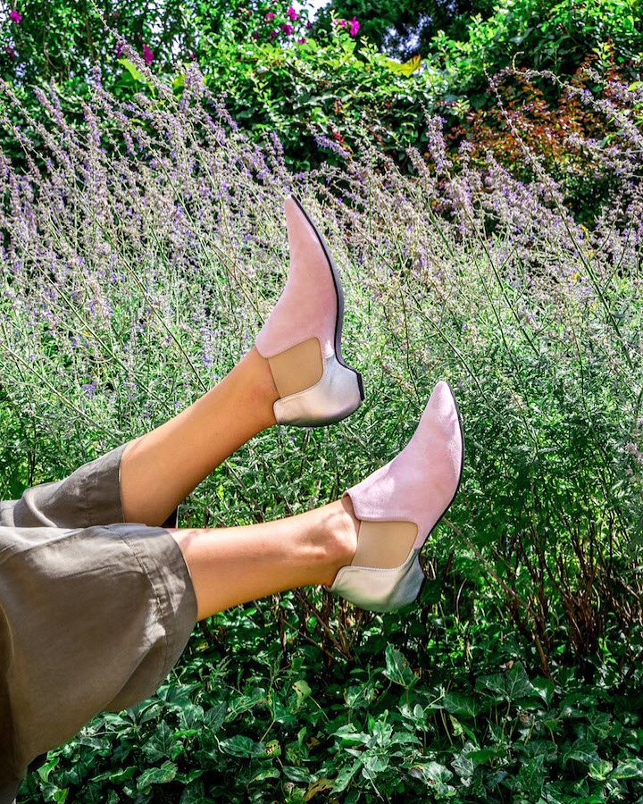 busstopboutique's tweet photo. Kick your feet up, it’s spring! PEONY is one of our many In-House Line #BusStopX shoes. Light mauve suede slip-on bootie, tan elastic sides with a brilliant silver metallic leather heel https://t.co/bn2gWwe1vV https://t.co/hJq21eEgdE