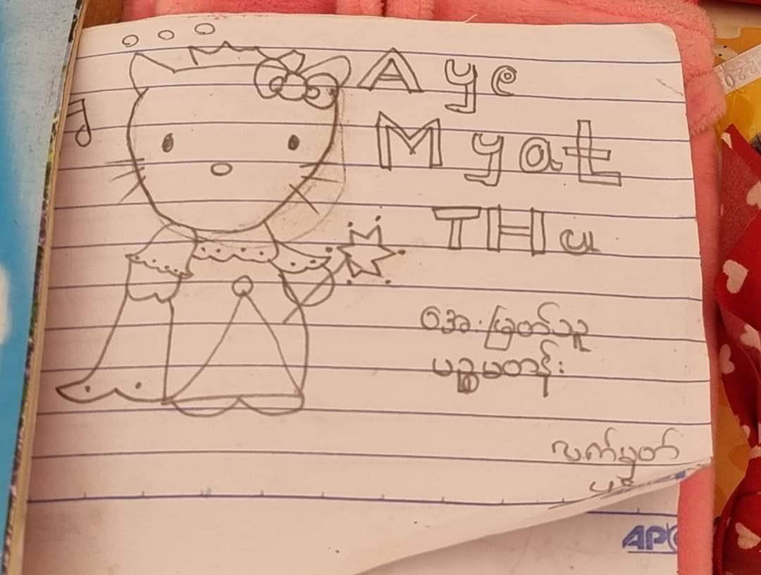 THETHTO29568623's tweet photo. Funeral of a 11 years old girl who was killed yesterday by military terrorists was held today. Colour pencils and drawing books are seen in the coffin of a drawing loving child.
JUNTA MASSACRE 
#WhatsHappeningInMyanmar  
#Mar28Coup https://t.co/oHvp3obZWD