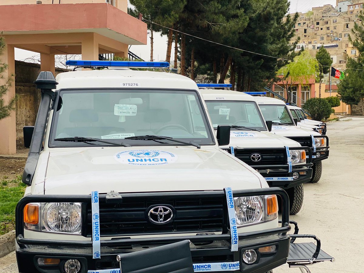 UNHCRAfg's tweet photo. @UNHCRAfg, today handed over 9 #Ambulances to @MoPHAfg to reach out to people, including #Returnees #IDPs, in rural areas and #strengthen #GoIRA #COVID19 #preparedness #response efforts. #HealthforAll #LNOB #Afghanistan https://t.co/03I36pS5Pz