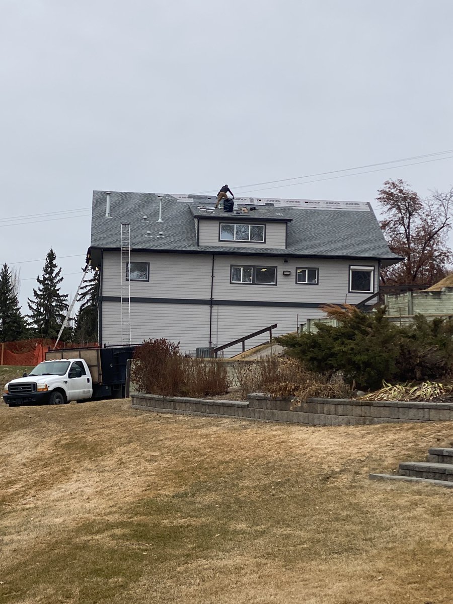 Working hard to beat the incoming weather.