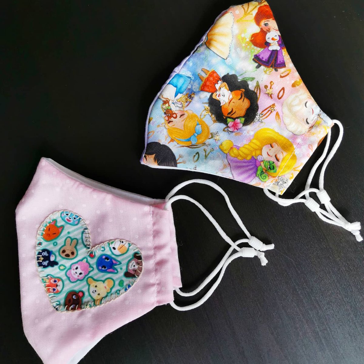 LeGoldenSnitch's tweet photo. I made some cute new masks 💕 both available and I'll be doing more/taking custom orders for more like these 😁 #wearamask #disney #animalcrossing #cute #SupportLocalBusinesses https://t.co/POU8t5pp7Q
