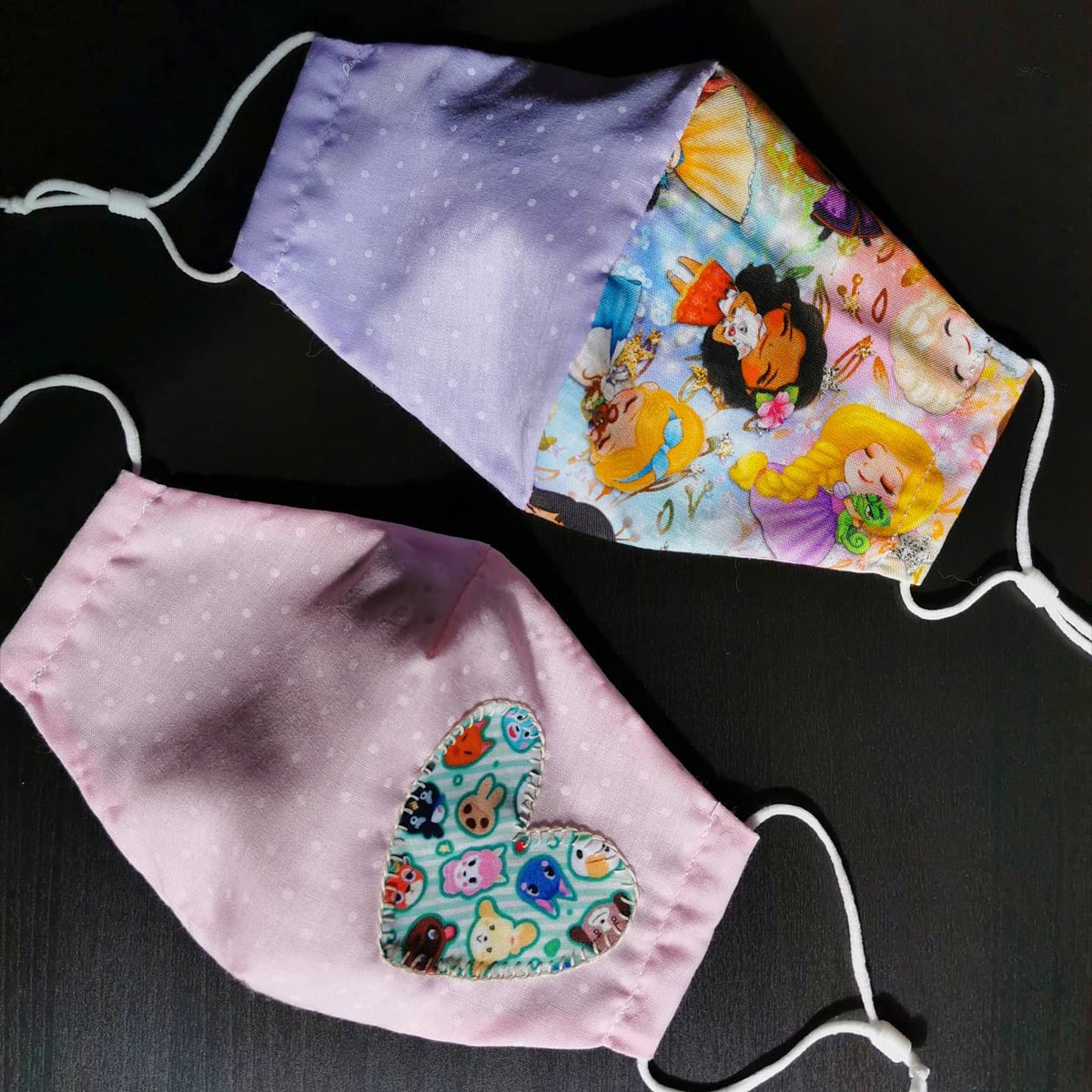 LeGoldenSnitch's tweet photo. I made some cute new masks 💕 both available and I'll be doing more/taking custom orders for more like these 😁 #wearamask #disney #animalcrossing #cute #SupportLocalBusinesses https://t.co/POU8t5pp7Q