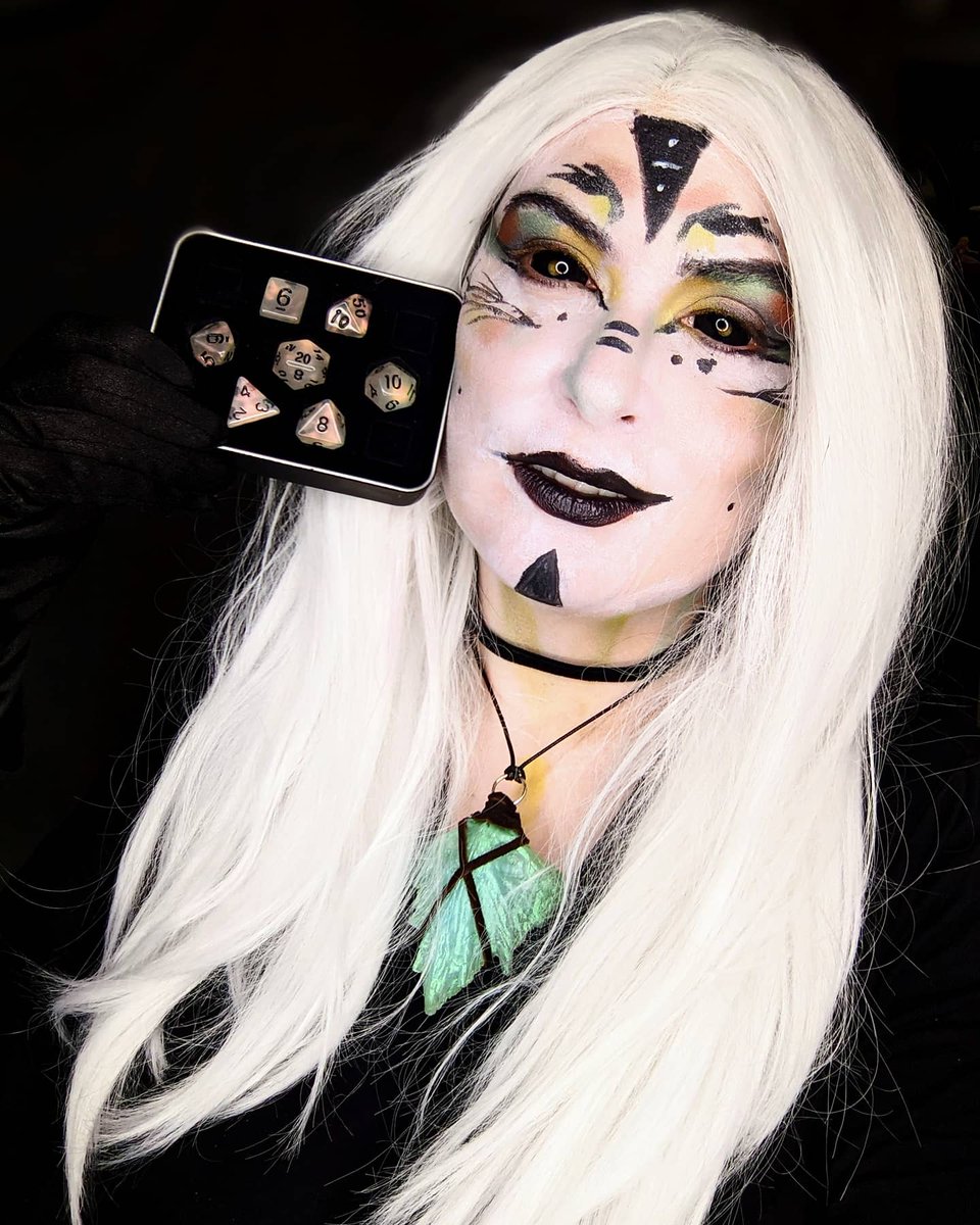 EAdventuress's tweet photo. Makeup and character inspired by @dieharddice luminous chrome dice. 

I call this character Lumix.

Dice @diehardice
Contacts @PinkyParadise2U

Use my code EverMar in March and EverApr in April to get a discount code when ordering dice from Diehard.

#dnddice #dndmakeup https://t.co/O24HHc9gtp