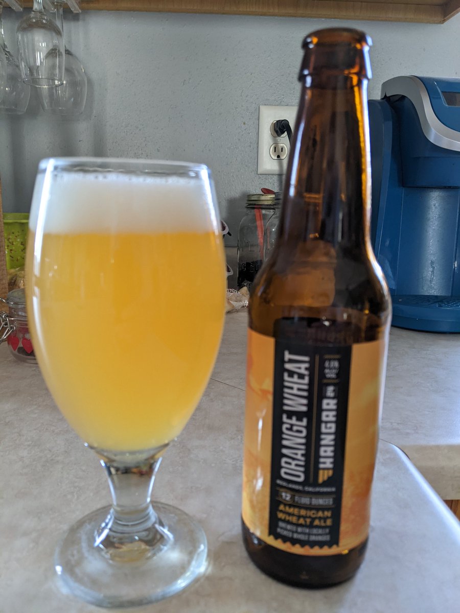 Orange Wheat Ale from <a href="/Hangar24Brewing/">Hangar 24 Craft Brewing</a>. More of a sour, tart, taste than anything. Still quite refreshing though. 🍺 #CraftBeer