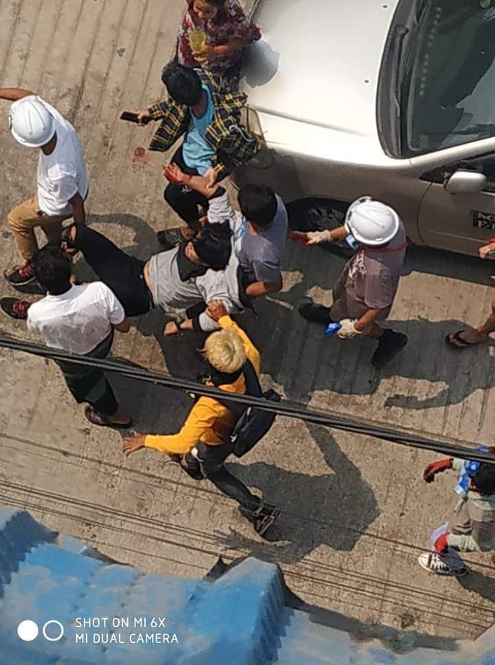 maytoekhine's tweet photo. Terrorists dispersed the crowd in #Tharketa using live rounds. One headshot and the other two on hand. #WhatsHappeningInMyanmar #Mar29Coup https://t.co/3bSVNIUtlJ