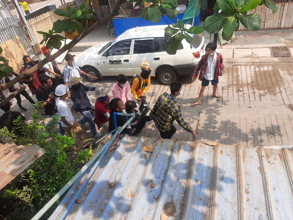 Terrorists dispersed the crowd in #Tharketa using live rounds. One headshot and the other two on hand. #WhatsHappeningInMyanmar #Mar29Coup