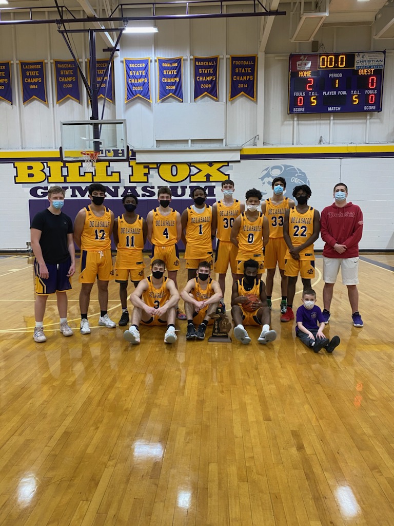 .<a href="/DeLaSalle_BB/">De La Salle Basketball</a> is district champs! 

NOTE: 2-0 score is the result of Warren Fitzgerald having had to forfeit due to COVID. 

The Pilots advance to the regional semifinal round Tuesday at 7 p.m. vs. Detroit King. Game will be hosted at DLS. 

#GoPilots #PilotPride