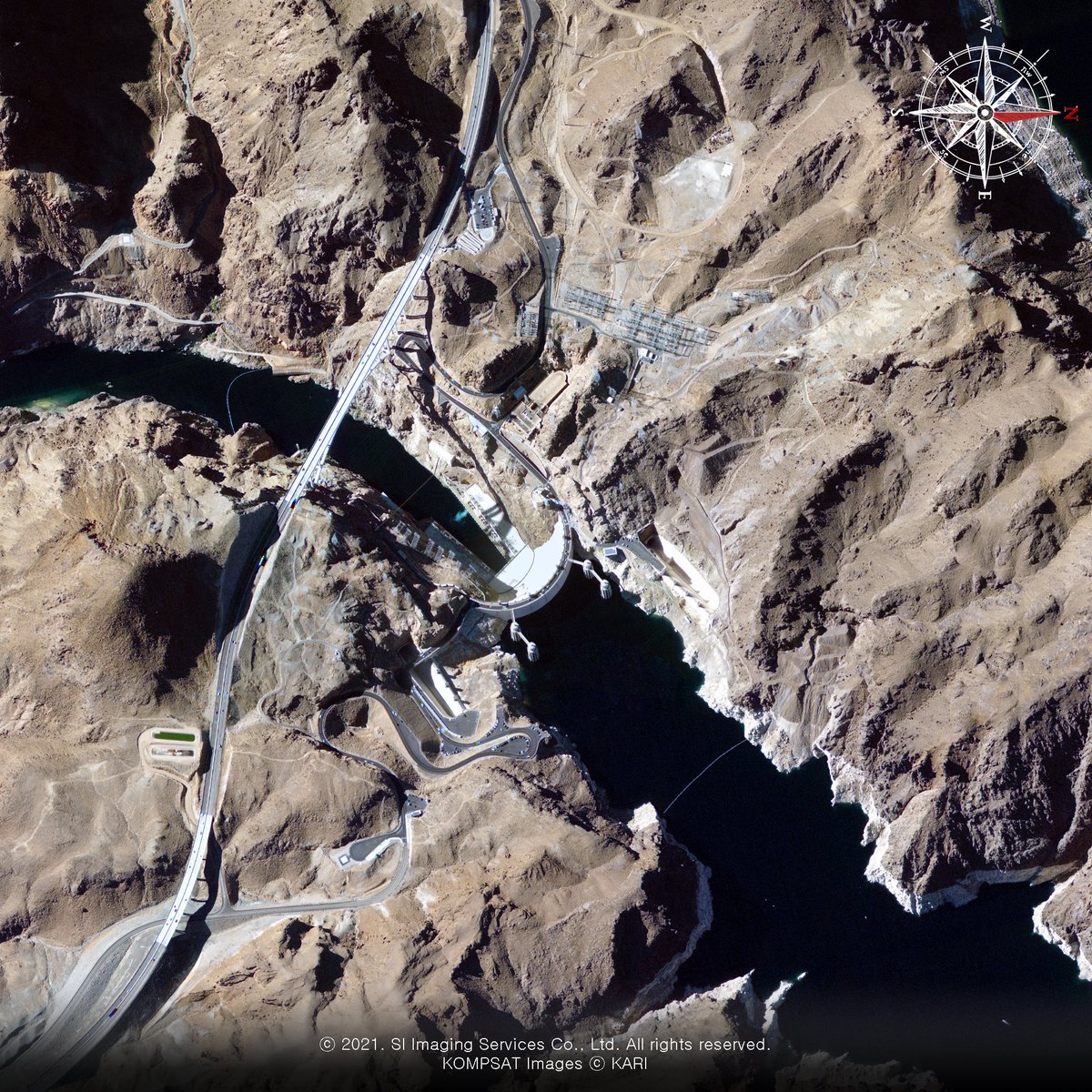 This is a concrete dam in Nevada, United States. It protects southern California and Arizona from the disastrous floods and supplies water and power to L.A. Mike O'Callaghan–Pat Tillman Memorial Bridge is a bridge that creates faster route over the dam. What is this dam?