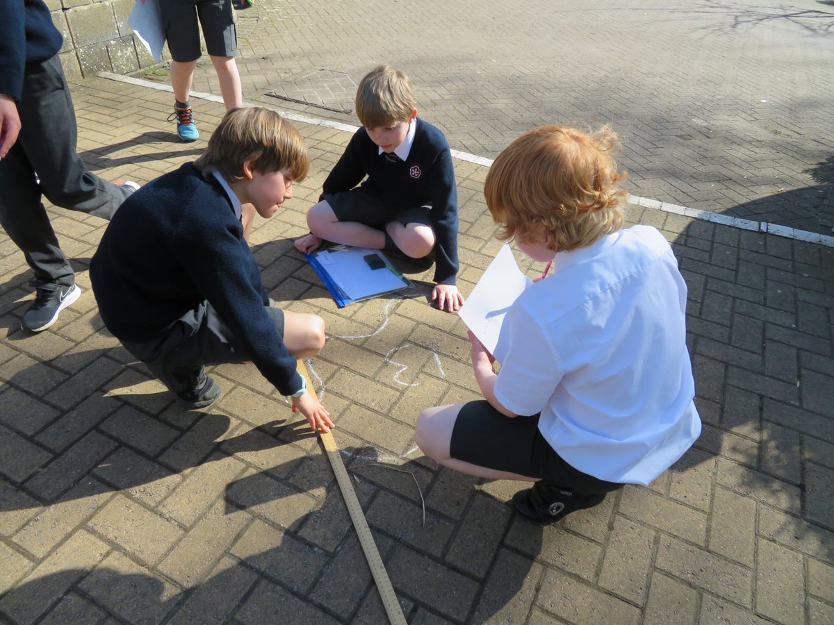 KESBathJunior's tweet photo. In Maths Year 4 have been exploring area &amp; perimeter of 2D polygons, and on Wednesday they took their learning outside to draw regular and irregular shapes to test out their perimeter finding skills. 

It wasn't long before Mr Taylor was joining in the fun!

#KESBathJnrLearning https://t.co/TcxvBsQqu2