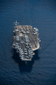 TheCVN69's tweet photo. Pictured here is 4.5 acres of bad-guy butt kicking Aircraft Carrier. Deployed forward we are providing leaders with quick response options for nearly any challenge - from confronting rivals to helping local populations recover from natural disasters. #WeLikeIKE https://t.co/5Yo4ZtUvC6