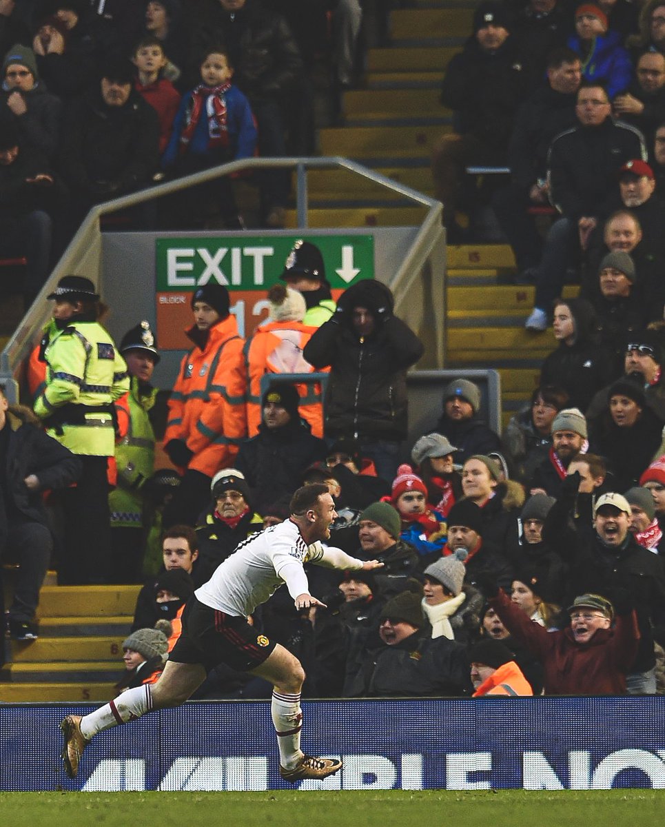 Wayne Rooney celebrates his winning goal during a Premier League match against Liverpool at Anfield. January, 2016.