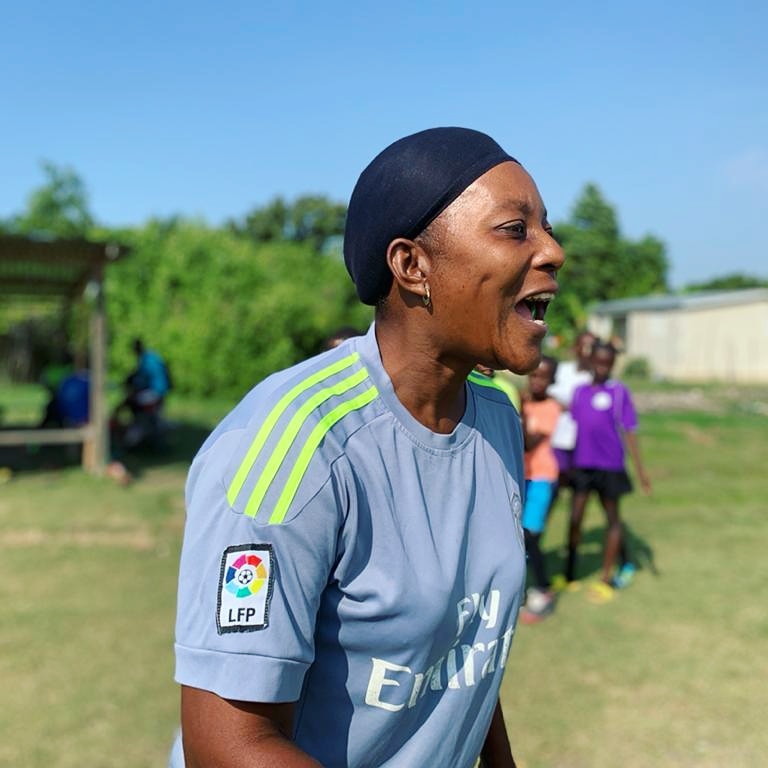 goalshaiti's tweet photo. Coach Marie Flore is a leader on & off the field. A former goalie for the #Haitian National team she gives back by sharing her love of the game and #community service. #teamgoals #leadership #development #football #soccer #giveback #mentor #Haiti https://t.co/VHcR9YmnGX