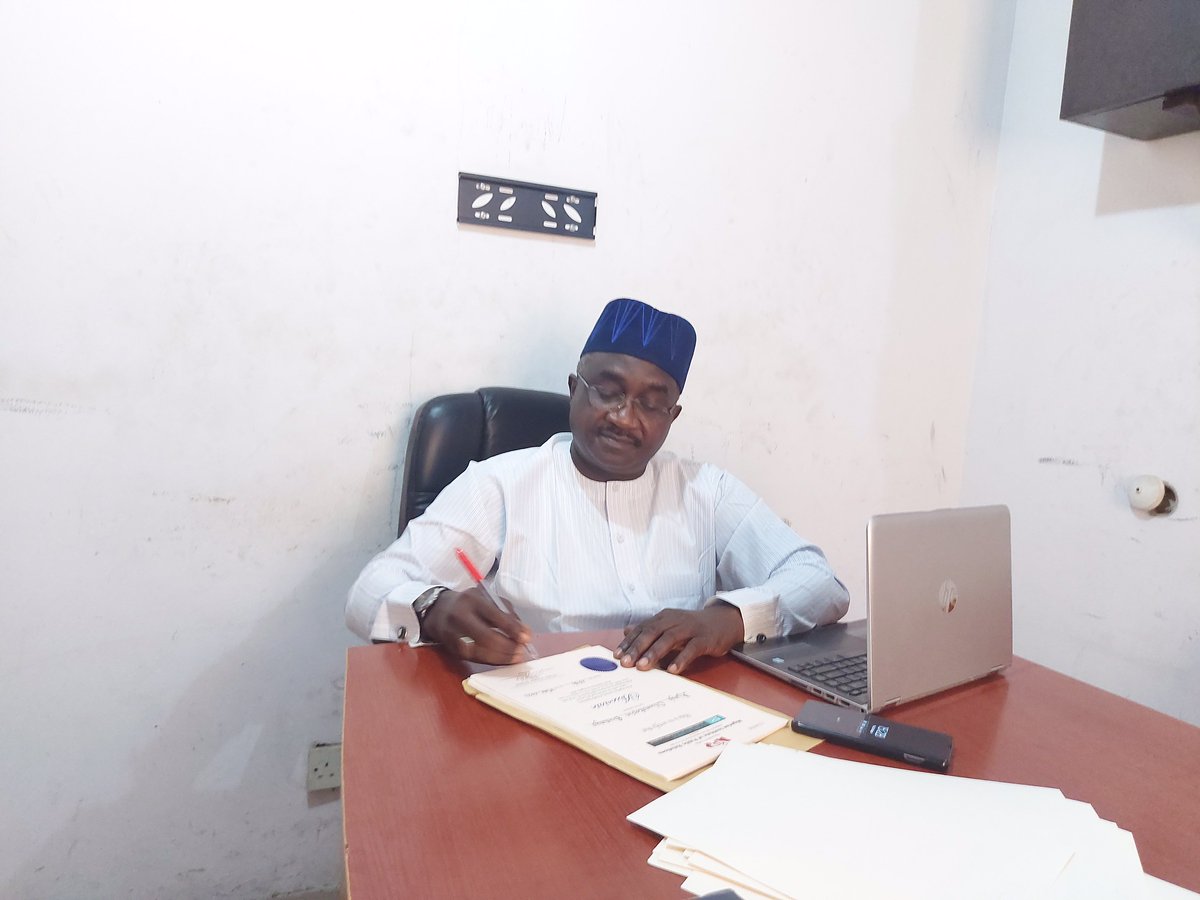 NIPR_AGM's tweet photo. Mallam MUKHTAR ZUBAIRU SIRAJO, 
President and Chairman of Council signing 
Membership Certificates of new inductees https://t.co/Z9aPcq1I4B