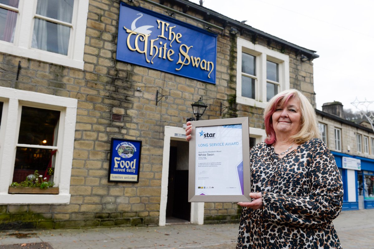 starpubsuk's tweet photo. It’s a double celebration at one #HebdenBridge pub.👍

Not only is The White Swan preparing to open for the first time in 5 months, but licensee Elizabeth has received a long-service award to mark her 40th anniversary at the pub! Congratulations Elizabeth cheers to you! 🍻 https://t.co/Sgt6pbe30P