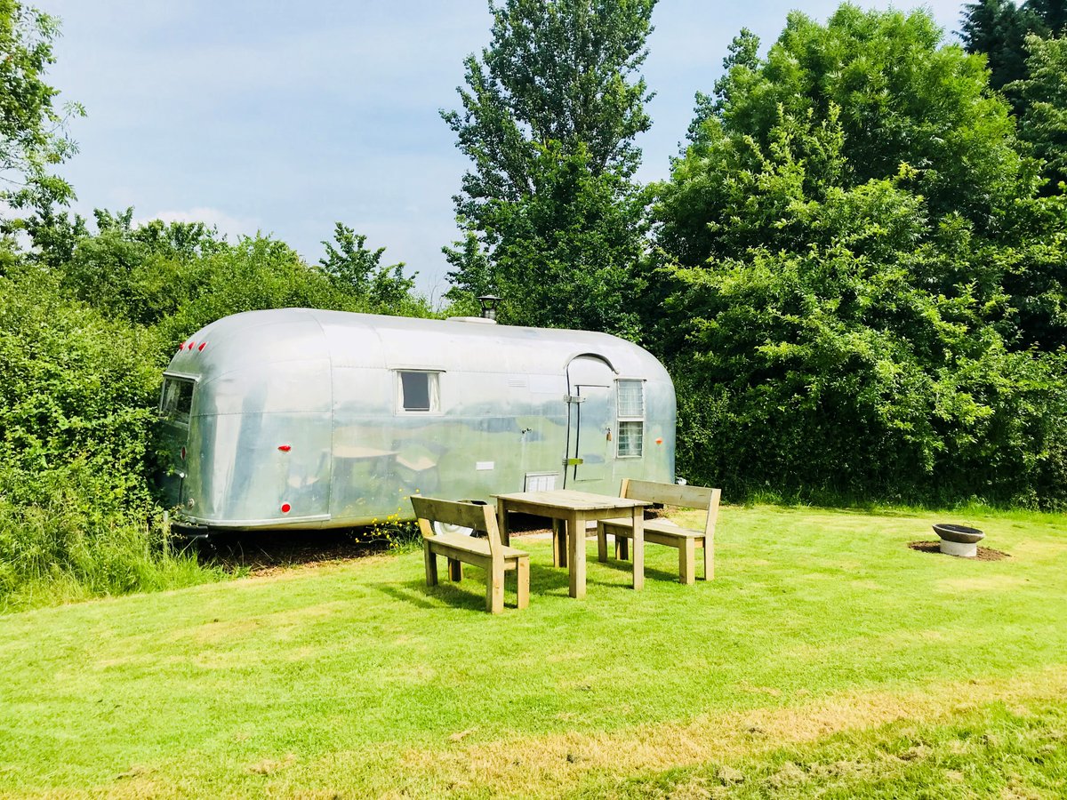 Holycombe's tweet photo. Yurt Yami and Airstream Ana have an ensuite and Little Dutch, Yasmin and Gyspy Caravan will have private use of the glamping bathroom or one camping shower and flush loo. All campers must have their own shower/toilet facilities until sharing is allowed from May 17th https://t.co/G5sYTqSHXA