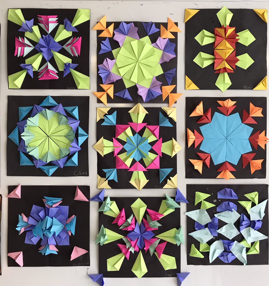 PEESMsD's tweet photo. This paper folding symmetrical art created by students in 6D makes me smile every time I look at it. Cheerful and bright! https://t.co/VxT77O8Xpe