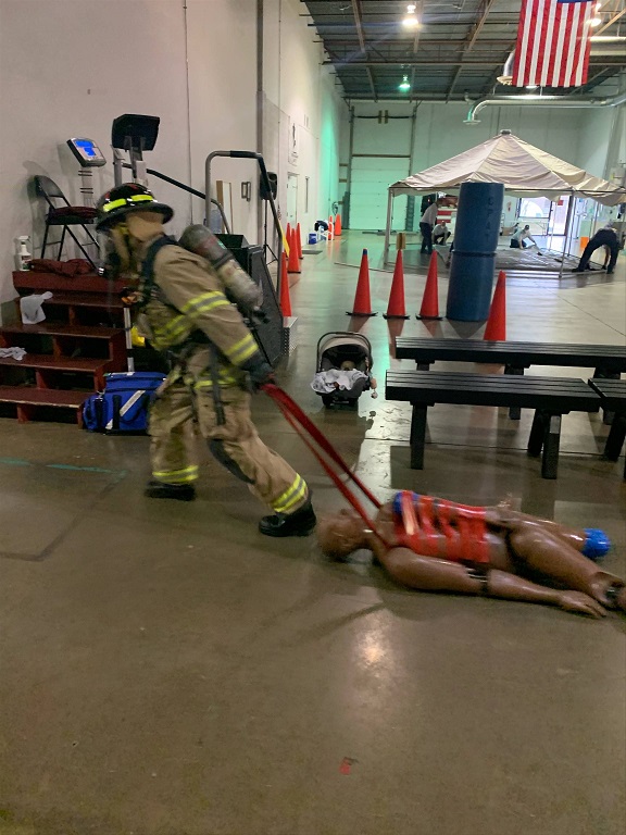 ffxfirerescue's tweet photo. Technician Vukmanic-Almquist had a special fan section as she did work performance to return to duty. Baby son Leo watched Mom flawlessly complete course! Said Tech Vukmanic-Almquist, “Being a firefighter and a mom at the same time is hard, but doable. Both are worth it!” #FCFRD https://t.co/Kp2f3RU7vr