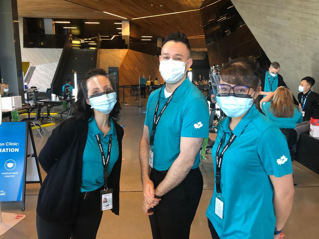 WestJet's tweet photo. Beginning today, 200 WestJetters are assisting with mass vaccination efforts in Greater Vancouver. We’re proud to partner with the Government of BC in protecting Canadians, and we know our WestJetters will bring the care they’re known for to these clinics. https://t.co/9OelFk3zyL https://t.co/0DvuXR2jix