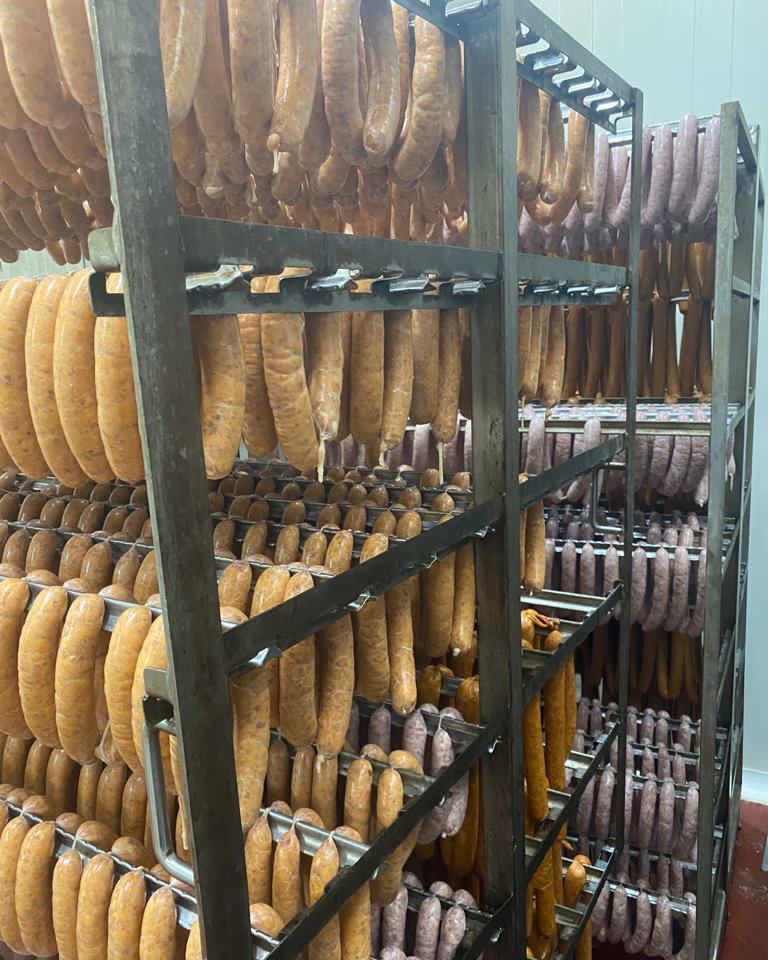 PeterBouchier's tweet photo. We love this view from the cool room door. The only thing better than the view is wonderful smell. #Kransky #frankfurts #smallgoods #butcher #smokedmeat https://t.co/i1MfcGixBS
