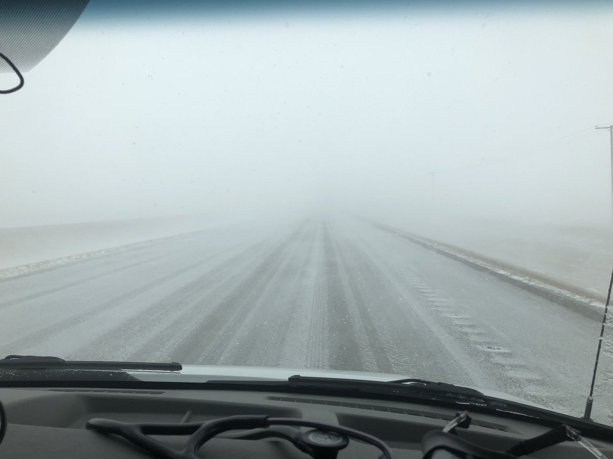 MooseJawEMS's tweet photo. PLEASE stay off the Highways today... this is our @MJParamedics crew travelling West on Hwy 1 going to a multi-vehicle accident.  ZERO visibility and ice-covered highways.  PLEASE stay home so everyone remains safe! @SGItweets @SKGovHwyHotline https://t.co/fHHN1h8DtG