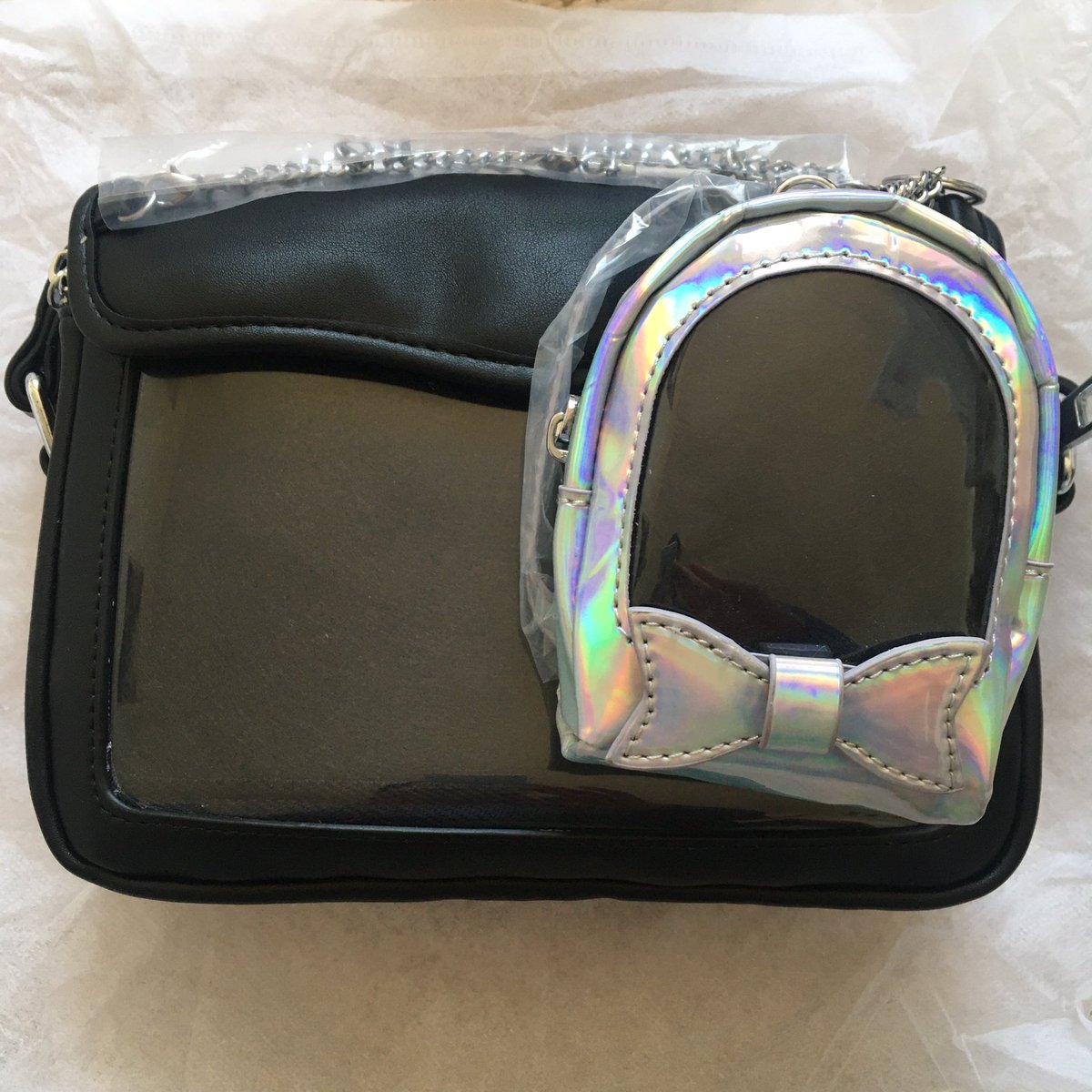 mashimero's tweet photo. I heard you like ita bags so I put an ita bag on your ita bag 🤣🤣🤣 the small one is a keychain so I can hook it onto any bag and take a few pins with me! Will also be great for spare masks 😷 https://t.co/jJOwD4MESb