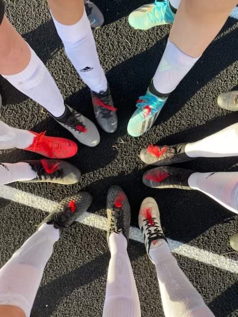 BHSSportsMarke3's tweet photo. I want EVERYONE to check this out - 

This is a picture of the Savannah Girls Soccer teams shoes tonight ..... 

They wore RED ribbon on their shoes as a symbol of support for all that our school is going through with the loss of Dr. McCoy .... 

This is total class https://t.co/ztw0csX4Ht