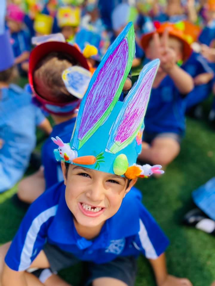 GSPS1889's tweet photo. Granville South students had an amazing time hopping around at the Easter Hat Parade today, showing off their wonderful hats! When students returned to class, they had a big surprise...the Easter Bunny had been sneaking around the school and had left footprints everywhere! https://t.co/GUmipyQDmM
