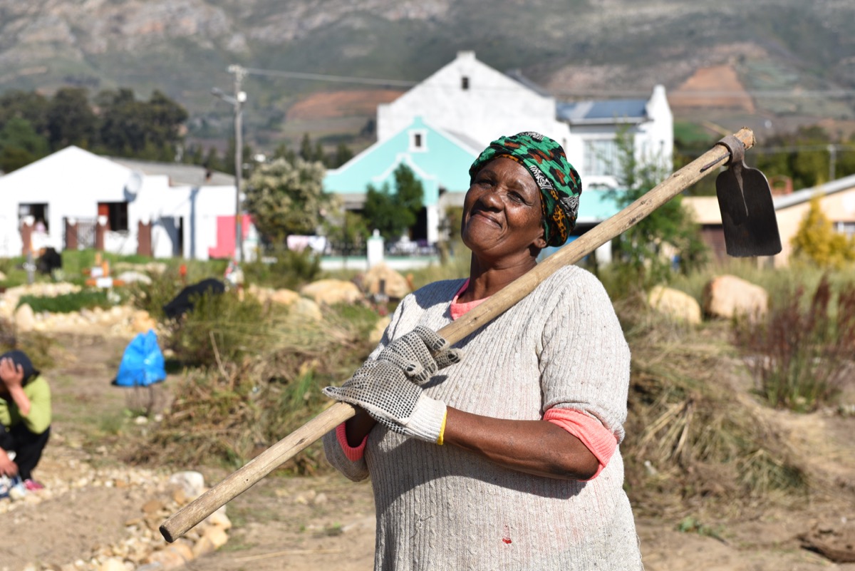 Mrs Siena Charles is a celebrated and esteemed local champion in Kylemore. She founded Siena's Nutrition Centre (SNC) nearly 18 years ago. SNC is currently undertaking the complete restoration and beautification of the local graveyard/cemetery in partnership with Vollar.