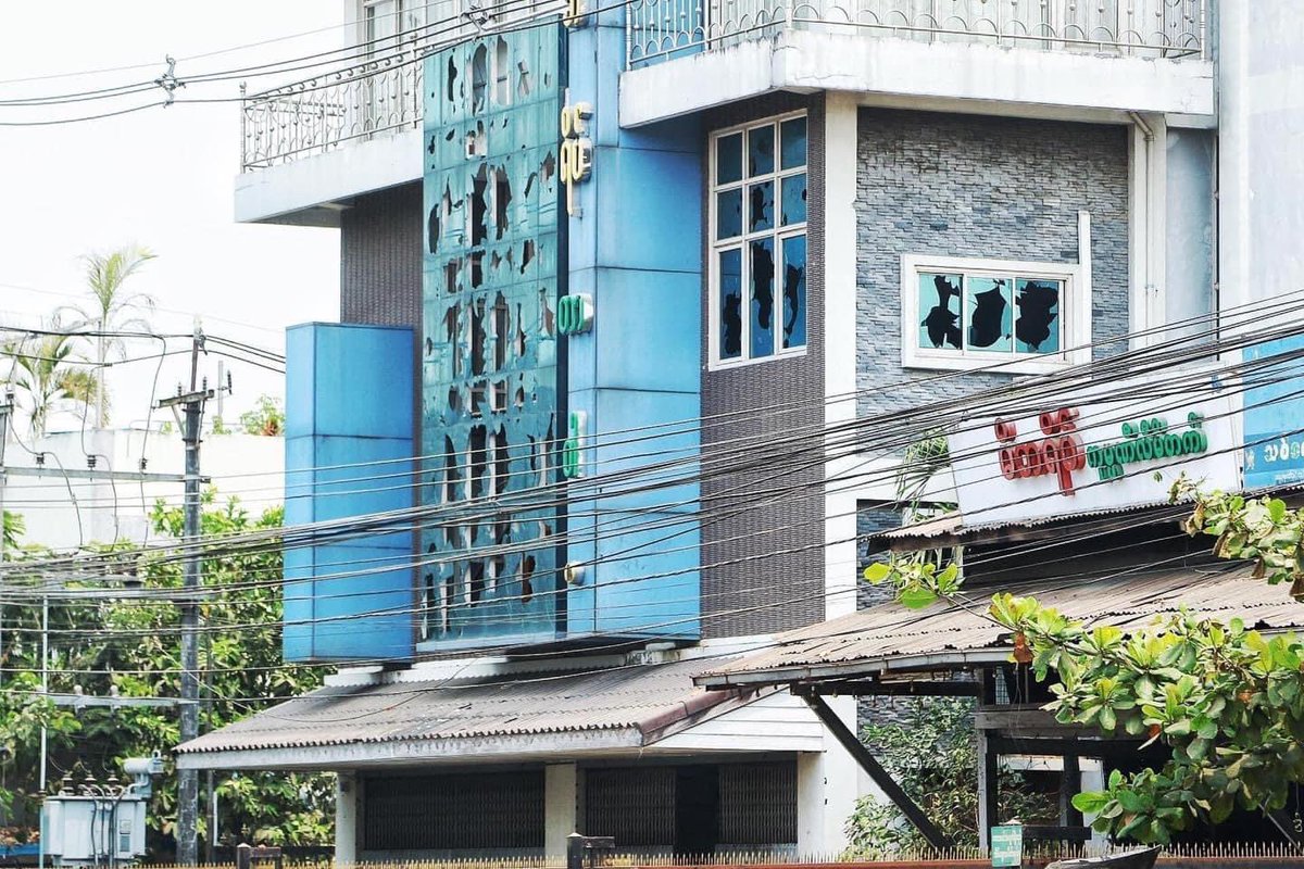 poemamhethar's tweet photo. After cruel night raid at South Dagon with burnt cars, bullets broken windows , destroyed phone &amp; wifi cables like a war-zone, some people have fled the area &amp;. the whole township looks like demolished zone. #WhatsHappeningInMyanmar #Mar30Coup https://t.co/ntsg3x7vHl