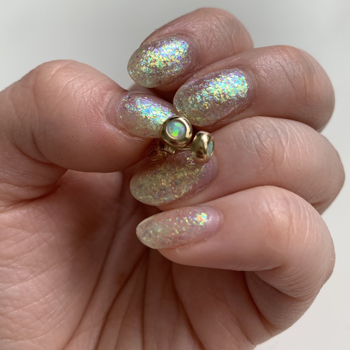 AnniLehtonen_'s tweet photo. This weekโs #HoloTacoCombo - #opalnails โจ created by layering @holotaco #LunarUnicornSkin and #GalacticUnicornSkin ๐ฆ featuring my beautiful opal ring and earrings, also known as inspiration! โจ #HoloTaco #NailArt https://t.co/aYPLiIQ6m4