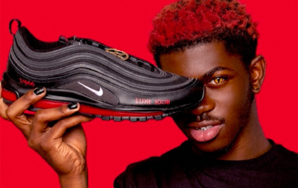 AJEnglish's tweet photo. Nike sues New York-based company over “Satan Shoes” purported to contain a drop of human blood https://t.co/T0kvtKw9ju https://t.co/uwPfD5ExbF