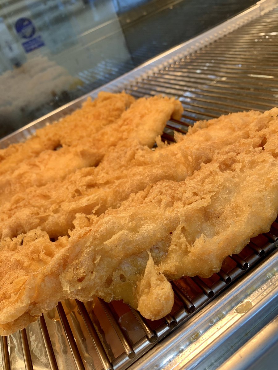 Freshly battered and absolutely delicious, order in store or click and collect and delivery available through foodhub! 
Nothing better than fish &amp; chips in the sunshine ☀️ #EatLocal #lovefood #lovefishnchips #lovefish #glutenfree #Vegan