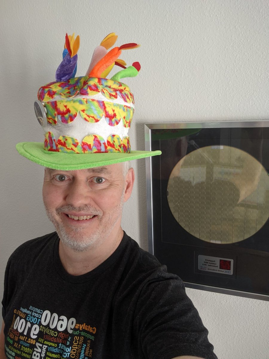 petergjones's tweet photo. @CiscoLive Remember this #CiscoLiveHat?
And yes, that's a #UADP wafer in the frame. Goes with the #Cat9K #ShirtSwag. 
#CiscoLive https://t.co/tpV1BvSMoT