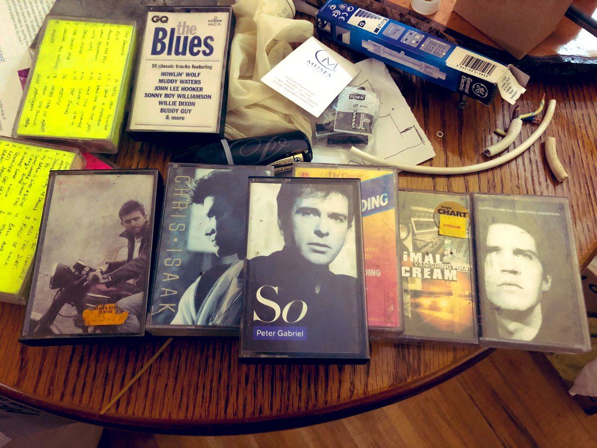 WildHoneyInn's tweet photo. Rooting in my store room. Found these. I suppose they are called vintage now. The psychedelic tapes, recordings from vinyl for the de rigueur car stereo. Bumpy roads and raveled cassette tapes 😂😂😂🙄 and an old business card from Muses our old place #musettes #memories https://t.co/pXtkHL4dlO