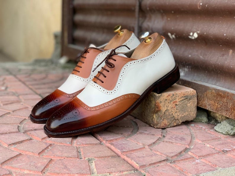 BazaarLeather's tweet photo. #mens #leather #bazaar #menshoes #leathershoes #handmadeshoes #brogueshoes #whitebrownshoes #designershoes #streetwear #streetstyle #styleoftheday #mensfashion #fashionoftheday #fashionshoes #beautifulshoes #footwearformen #brandedshoes #luxuryshoes |TLB https://t.co/MjQHv2s63d https://t.co/PAhJX36vw7