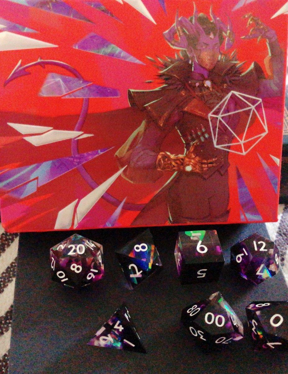 Musicalimbo's tweet photo. My Warlock Deluxe dice set from @EVERYTHINGDICE arrived today!! They’re so freaking gorgeous!! I’m looking forward to the weekend for dnd! One campaign I run and the other I’m a player in. My collection of dice is slowly growing!! https://t.co/u8DSos7noM