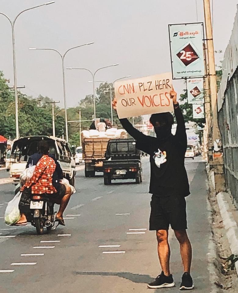 sanmonaung's tweet photo. “CNN PLZ hear our voice “ A boy holding their wish on the street of Myanmar. @clarissaward arrived to Yangon but she traveling around the city with heavily arm convey and difficult to meet with Myanmar people. #WhatIsHappeningInMyanmar #CNN #StandWithMyanmar https://t.co/K5u1w98nfn
