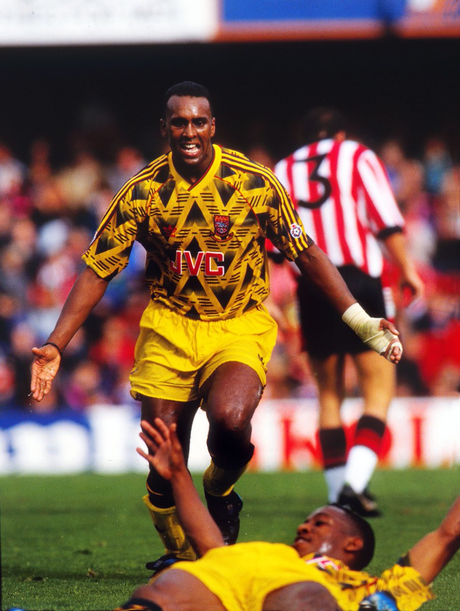 David Rocastle runs to celebrate with Ian Wright