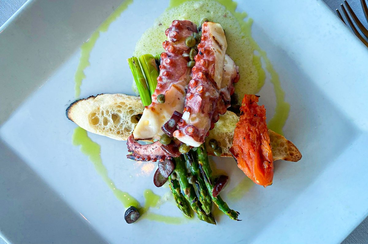 What has asparagus, roasted tomatoes, and Kalamata-style olives drizzled with lemon sauce??? The beyond delicious Grilled Spanish Octopus at Panevino!