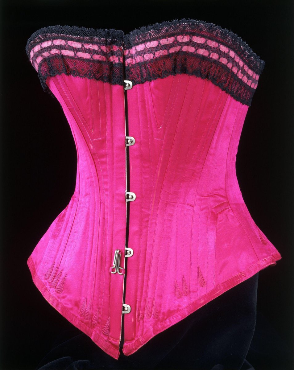 24 - This corset makes me *feel things.* Right around 1895 or so, so it's probably chemical dyed. The hook on the front is for the petticoat hitching -- you see similar bits and bobs for affixing the many layers found in gowns of the 19th century.